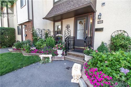 Enjoy your well maintained home! - 16 Larkshire Lane Unit#B, Ottawa, ON - Outdoor With Deck Patio Veranda