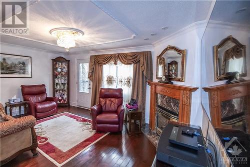 Living room - 16 Larkshire Lane Unit#B, Ottawa, ON - Indoor Photo Showing Living Room With Fireplace