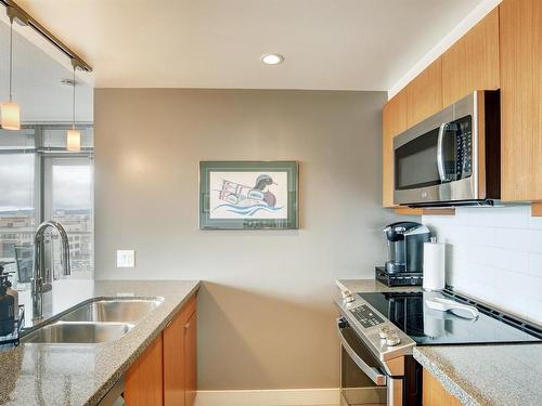 1002-760 Johnson St, Victoria, BC - Indoor Photo Showing Kitchen With Double Sink