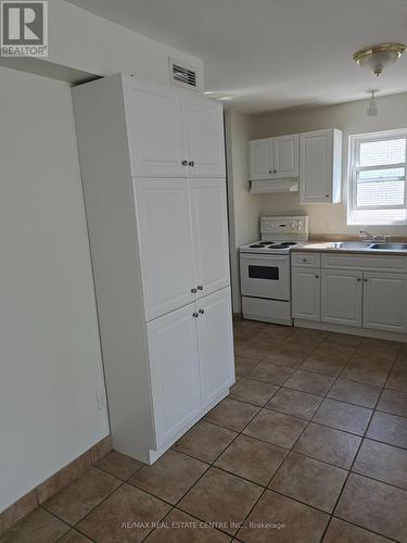 14 Columbia Street W, Waterloo, ON - Indoor Photo Showing Kitchen With Double Sink