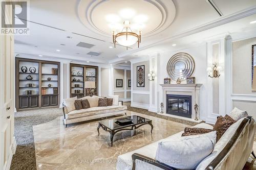 505 - 9245 Jane Street, Vaughan (Maple), ON - Indoor Photo Showing Living Room With Fireplace