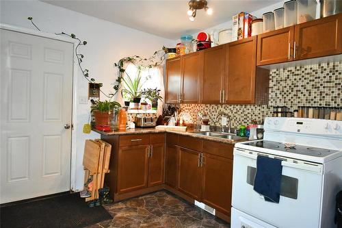 225 3Rd Avenue, Binscarth, MB - Indoor Photo Showing Kitchen With Double Sink