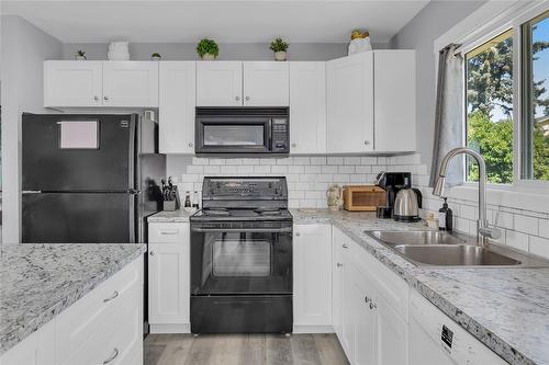 2322 Scenic Road, Kelowna, BC - Indoor Photo Showing Kitchen With Double Sink