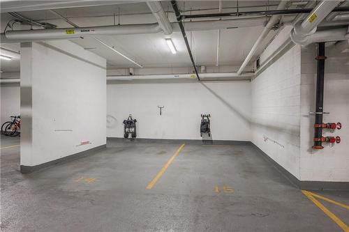 Best spots for parking - side by side parking spots on P1 (14&15) right by the elevator entrance. - 2025 Maria Street|Unit #1508, Burlington, ON - Indoor Photo Showing Garage