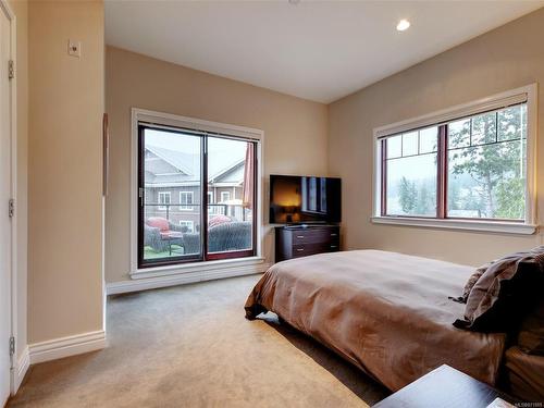 401-1335 Bear Mountain Pkwy, Langford, BC - Indoor Photo Showing Bedroom