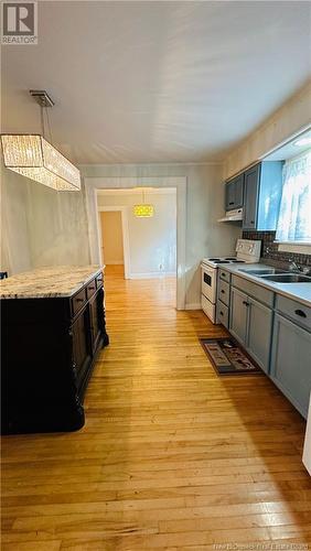 106 Noble Street, Woodstock, NB - Indoor Photo Showing Kitchen With Double Sink