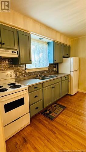 106 Noble Street, Woodstock, NB - Indoor Photo Showing Kitchen With Double Sink