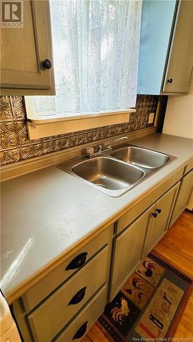 106 Noble Street, Woodstock, NB - Indoor Photo Showing Kitchen With Double Sink