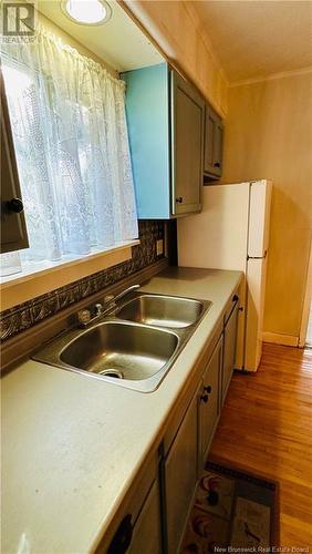 106 Noble Street, Woodstock, NB - Indoor Photo Showing Kitchen With Double Sink