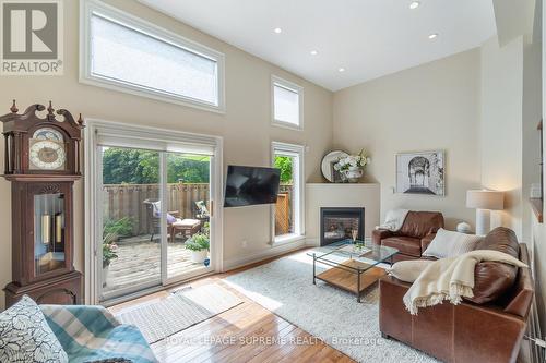 4 - 1764 Rathburn Road E, Mississauga (Rathwood), ON - Indoor Photo Showing Living Room With Fireplace