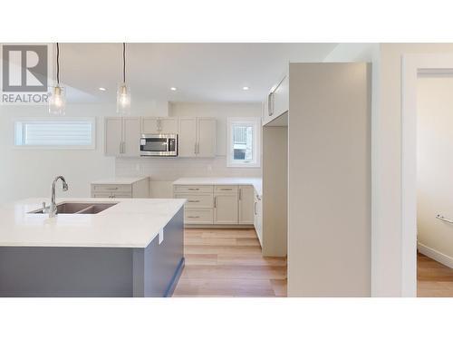 349 Legacy Lookout Unit# B, Cranbrook, BC - Indoor Photo Showing Kitchen With Double Sink