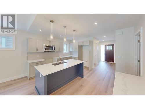 349 Legacy Lookout Unit# B, Cranbrook, BC - Indoor Photo Showing Kitchen With Double Sink With Upgraded Kitchen