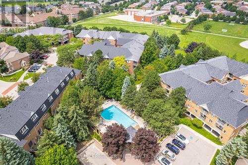 153 - 99 Bristol Road E, Mississauga (Hurontario), ON - Outdoor With In Ground Pool With View