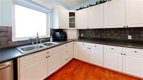 19 Maple Avenue W, Hamiota, MB - Indoor Photo Showing Kitchen With Double Sink