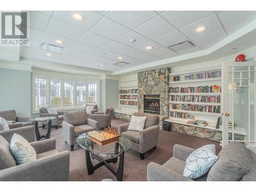 4534 Gallaghers Edgewood Court, Kelowna, BC - Indoor Photo Showing Living Room With Fireplace