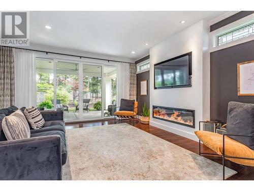 4534 Gallaghers Edgewood Court, Kelowna, BC - Indoor Photo Showing Living Room With Fireplace