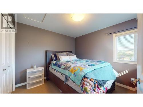 218 Glen Park Drive Unit# 21, Kelowna, BC - Indoor Photo Showing Bedroom