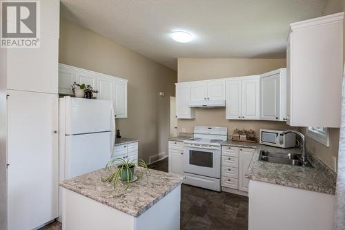 433 N Patterson Street, Prince George, BC - Indoor Photo Showing Kitchen With Double Sink