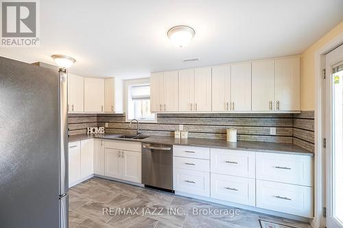 196 Millburn Drive, Clarington (Bowmanville), ON - Indoor Photo Showing Kitchen With Double Sink