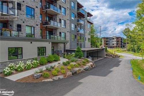 18 Campus Trail Unit# 306, Huntsville, ON - Outdoor With Balcony With Facade