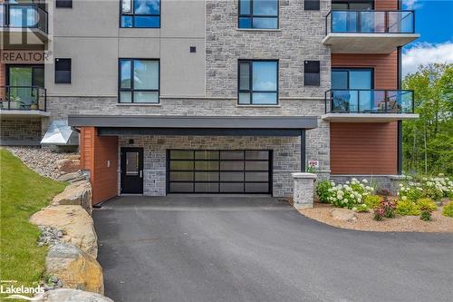 18 Campus Trail Unit# 306, Huntsville, ON - Outdoor With Balcony With Facade