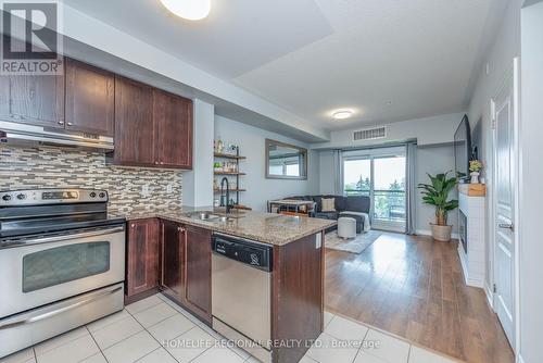 439 - 570 Lolita Gardens, Mississauga (Mississauga Valleys), ON - Indoor Photo Showing Kitchen With Double Sink With Upgraded Kitchen