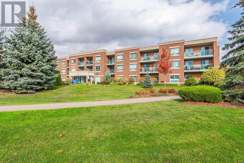 208 - 35 Via Rosedale W, Brampton (Sandringham-Wellington), ON - Outdoor With Balcony With Facade