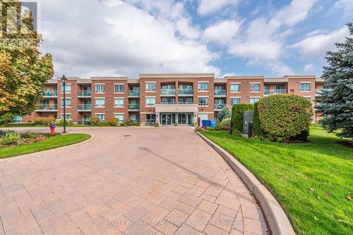 208 - 35 Via Rosedale W, Brampton (Sandringham-Wellington), ON - Outdoor With Balcony With Facade