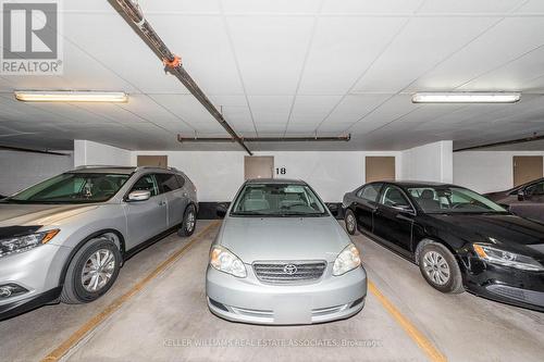 208 - 35 Via Rosedale W, Brampton (Sandringham-Wellington), ON - Indoor Photo Showing Garage