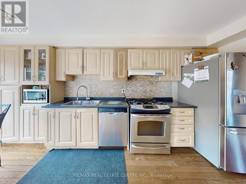 6155 Snowy Owl Crescent, Mississauga (Lisgar), ON - Indoor Photo Showing Kitchen With Double Sink