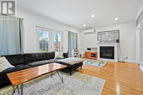 6047 Ross Street, Niagara Falls, ON - Indoor Photo Showing Living Room With Fireplace