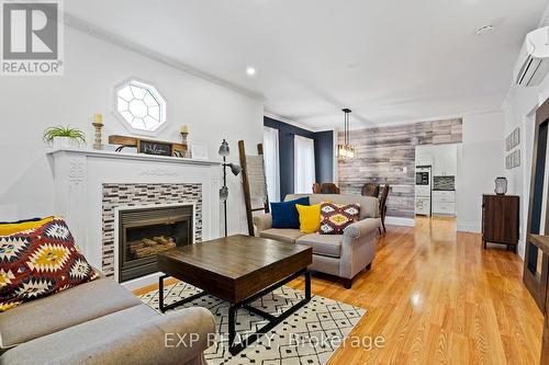 6047 Ross Street, Niagara Falls, ON - Indoor Photo Showing Living Room With Fireplace