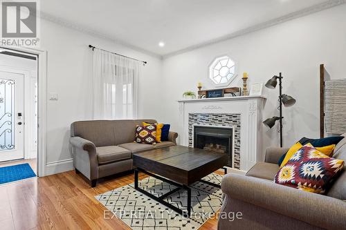 6047 Ross Street, Niagara Falls, ON - Indoor Photo Showing Living Room With Fireplace