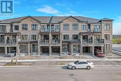 11 Tennant Circle, Vaughan (Vellore Village), ON - Outdoor With Balcony With Facade