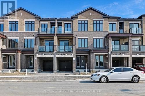 11 Tennant Circle, Vaughan (Vellore Village), ON - Outdoor With Balcony With Facade