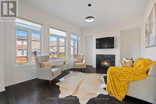 92 Holland Vista Street, East Gwillimbury, ON - Indoor Photo Showing Living Room With Fireplace