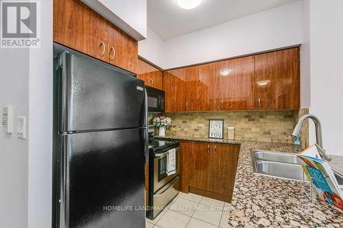 310 - 5793 Yonge Street, Toronto (Newtonbrook East), ON - Indoor Photo Showing Kitchen With Double Sink