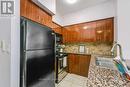 310 - 5793 Yonge Street, Toronto (Newtonbrook East), ON  - Indoor Photo Showing Kitchen With Double Sink 