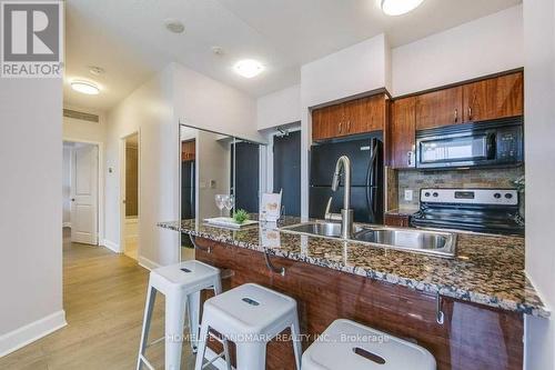 310 - 5793 Yonge Street, Toronto (Newtonbrook East), ON - Indoor Photo Showing Kitchen With Double Sink