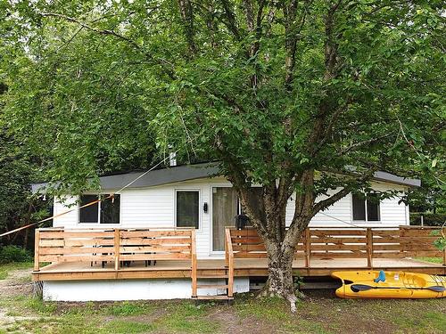 Back facade - 43 Ch. Du Lac-Victor, Lac-Des-Plages, QC - Outdoor With Deck Patio Veranda