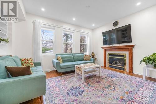 3 Cambior Crescent, Ottawa, ON - Indoor Photo Showing Living Room With Fireplace