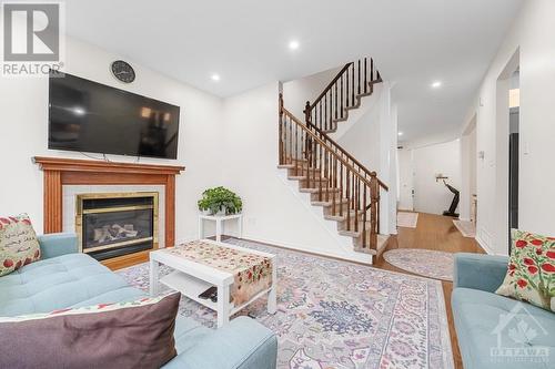 3 Cambior Crescent, Ottawa, ON - Indoor Photo Showing Living Room With Fireplace