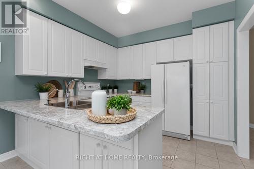 307 Waterbury Crescent, Scugog (Port Perry), ON - Indoor Photo Showing Kitchen With Double Sink