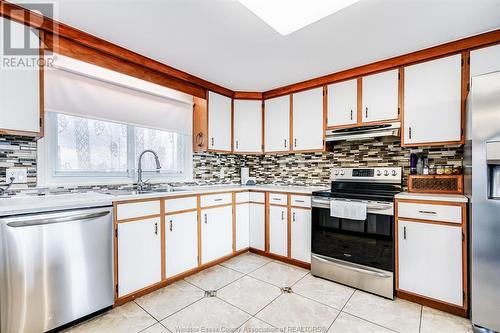 209 Cotterie Park, Leamington, ON - Indoor Photo Showing Kitchen With Double Sink