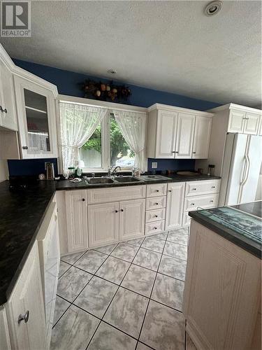 513 Tobique Road, Grand Falls, NB - Indoor Photo Showing Kitchen With Double Sink