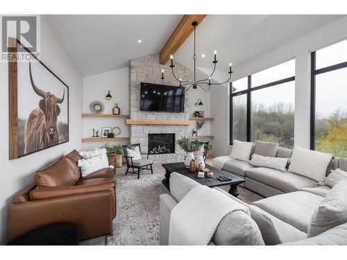 652 Trumpeter Road, Kelowna, BC - Indoor Photo Showing Living Room With Fireplace