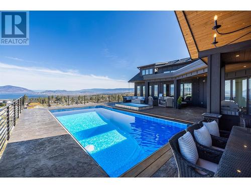 652 Trumpeter Road, Kelowna, BC - Outdoor With In Ground Pool With Deck Patio Veranda