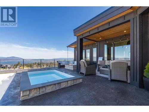 652 Trumpeter Road, Kelowna, BC - Outdoor With In Ground Pool With Deck Patio Veranda