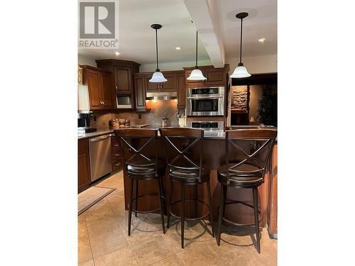 10701 Pinecrest Lane, Dawson Creek, BC - Indoor Photo Showing Kitchen With Upgraded Kitchen