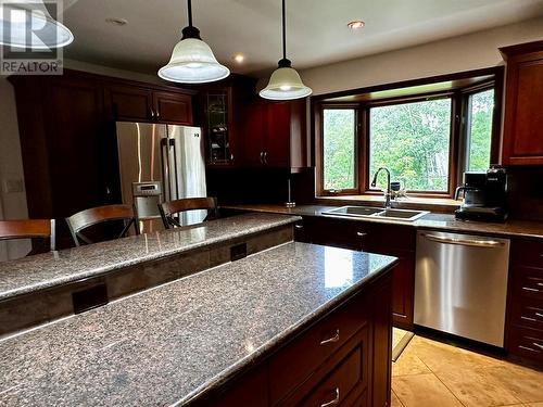 10701 Pinecrest Lane, Dawson Creek, BC - Indoor Photo Showing Kitchen With Double Sink